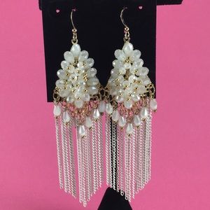 Goldtone and white crystal dangle fringe earrings